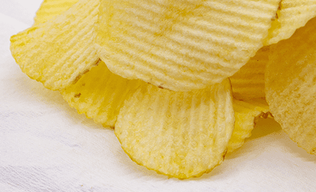 スナック菓子への油噴霧